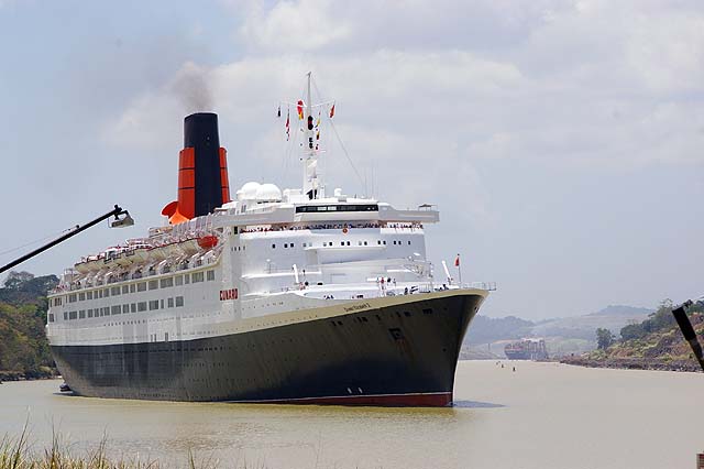 The RMS Queen leaving the Culebra Cut in the Panama Canal